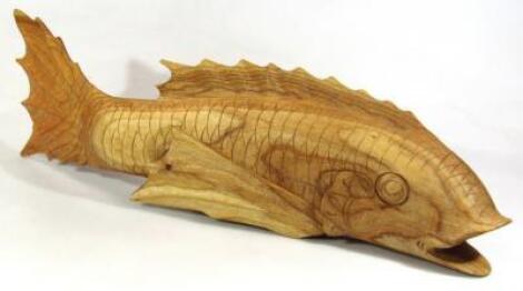 A 20thC carved model of a fish