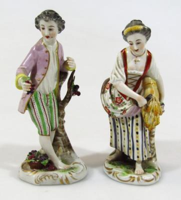 A pair of 19thC German porcelain figures