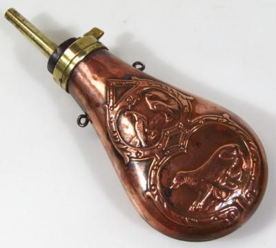 A 20thC copper and brass powder flask