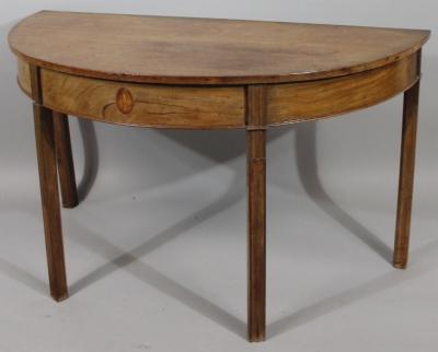 An early 19thC mahogany D-end table