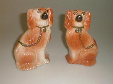 A pair of late 19thC Staffordshire pottery dogs