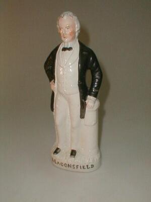 A 19thC Staffordshire figure of Lord Beaconsfield (Disraeli) standing