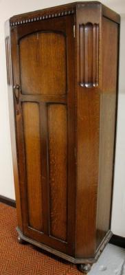 An early 20thC oak hall wardrobe