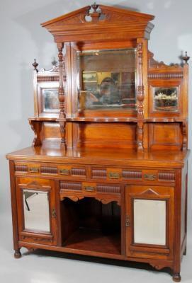 A late 19thC walnut mirror back sideboard