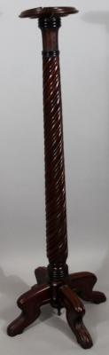 A late Victorian mahogany torchere stand