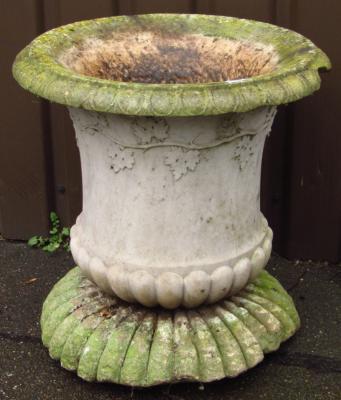 An early 19thC style concrete and stone urn planter