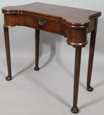 A George III mahogany fold over games table