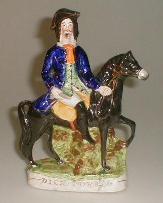 A 19thC Staffordshire pottery figure of Dick Turpin on Black Bess