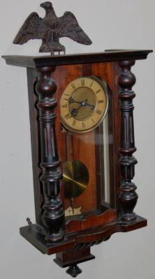 An early 20thC walnut Vienna style wall clock