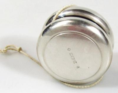 A silver yo-yo