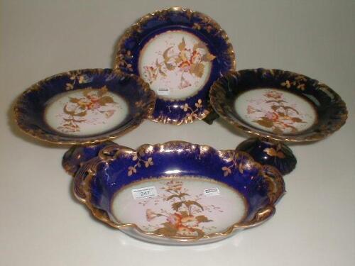 A French porcelain dessert service hand painted and gilded with flowers