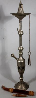 A metal opium style stand