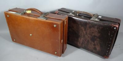 An early 20thC pressed leather travel case