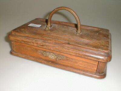 An early 20thC oak desk stand of rectangular form with 2 quill trays and