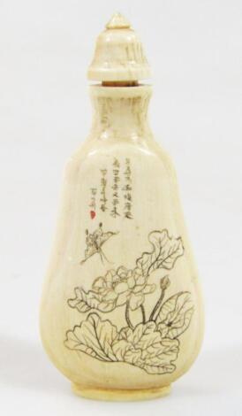 An inscribed Chinese ivory snuff bottle