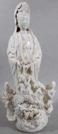 A 20thC Chinese semi porcelain blanc-de-chine figure of a lady