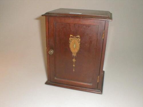 An Edwardian mahogany smokers cabinet