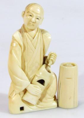 A 19thC Japanese ivory figure of a gentleman