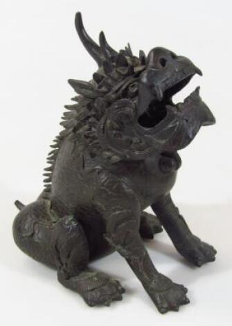 A Chinese bronze figure of a dragon