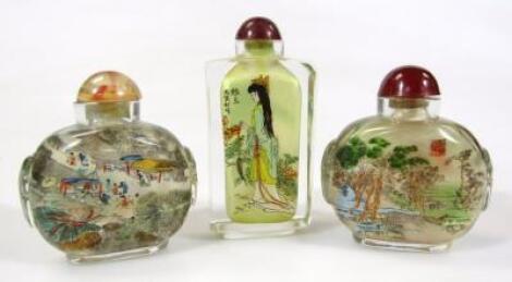 Three oriental reverse glass printed scent bottles