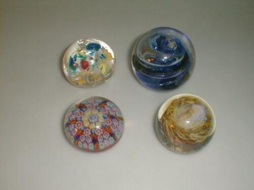 A millefiori paperweight and 3 swirl paperweights