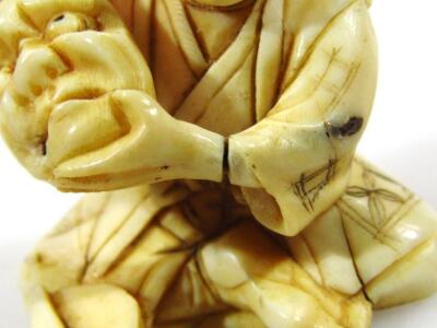 A 19thC Japanese ivory netsuke formed as seated gentleman - 6