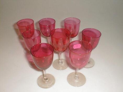 Eight Victorian cranberry wine glasses