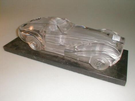 An Art Deco glass model of a car