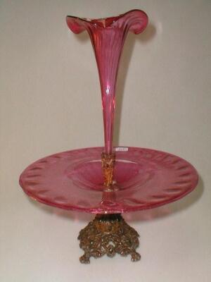 A cranberry glass centre piece