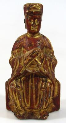 A 19thC Chinese carved giltwood and red lacquered figure