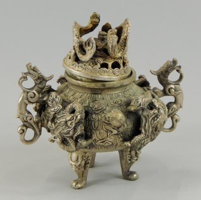 A Chinese white metal incense burner