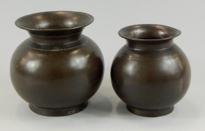 Two graduated 18thC Chinese bronze globular vessels