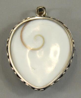 A silver mounted carved shell mask pendant of Shiva - 2