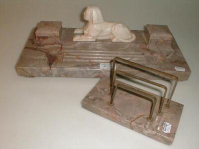 A marble desk stand with an onyx sphinx mount and letter rack (2)