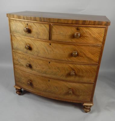 A Victorian bow front mahogany chest of drawers from Mowbray of Boston