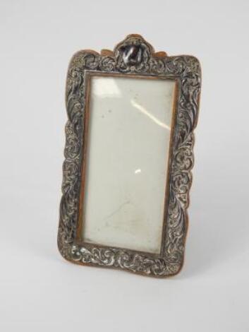 An Edward VII silver strut photograph frame