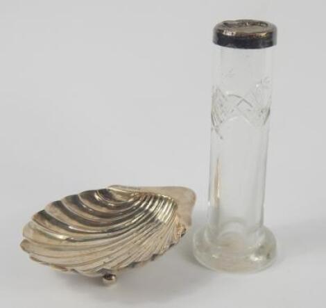 An Edward VII silver scallop shell butter dish