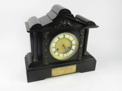 A Junghans slate and marble cased late 19thC mantel clock