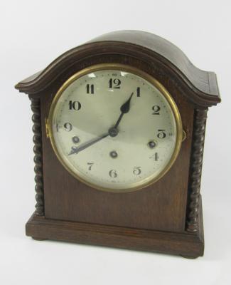 A German oak cased early 20thC mantel clock
