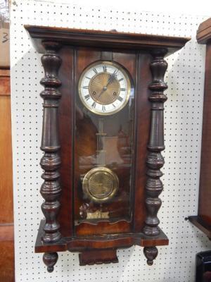 An American late 19thC mahogany and pine wall clock