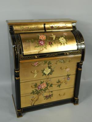 A gilt and black lacquered cylinder bureau