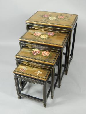 A quartetto of gilt and black lacquered occasional tables