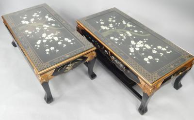 A pair of gilt and black lacquered rectangular occasional tables