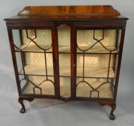 An early 20thC mahogany display cabinet