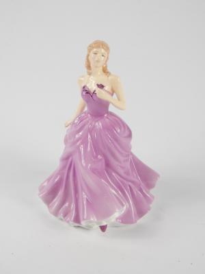 A Royal Doulton figure modelled as Victoria