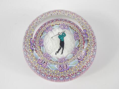 A Perthshire paperweight designed with a golfer to the centre