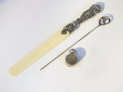 A late 19thC Continental ivory and white metal mounted paper knife