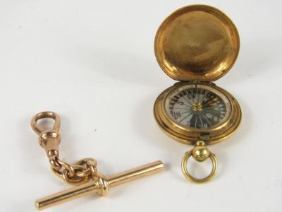 A 15ct gold T-bar and snap clasp, 5.9g, together with a gold plated hunter cased pocket compass.