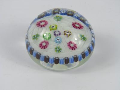 A Perthshire spaced millefiori and silhouette cane paperweight