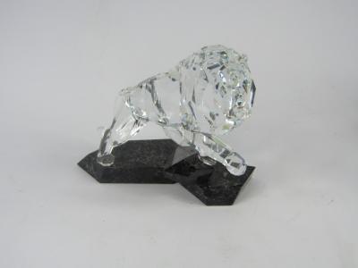 A Swarovski crystal model of a lion